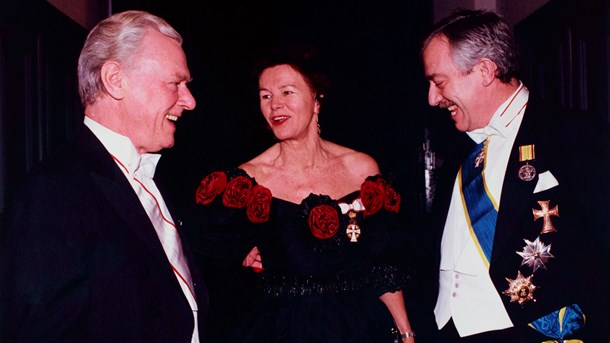 Tidligere kulturminister Grethe Rostbøll (K) her i selskab med Poul Schlüter og Uffe Ellemann Jensen til Dronning Margrethes nytårstaffel i residenspalæet på Amalienborg.