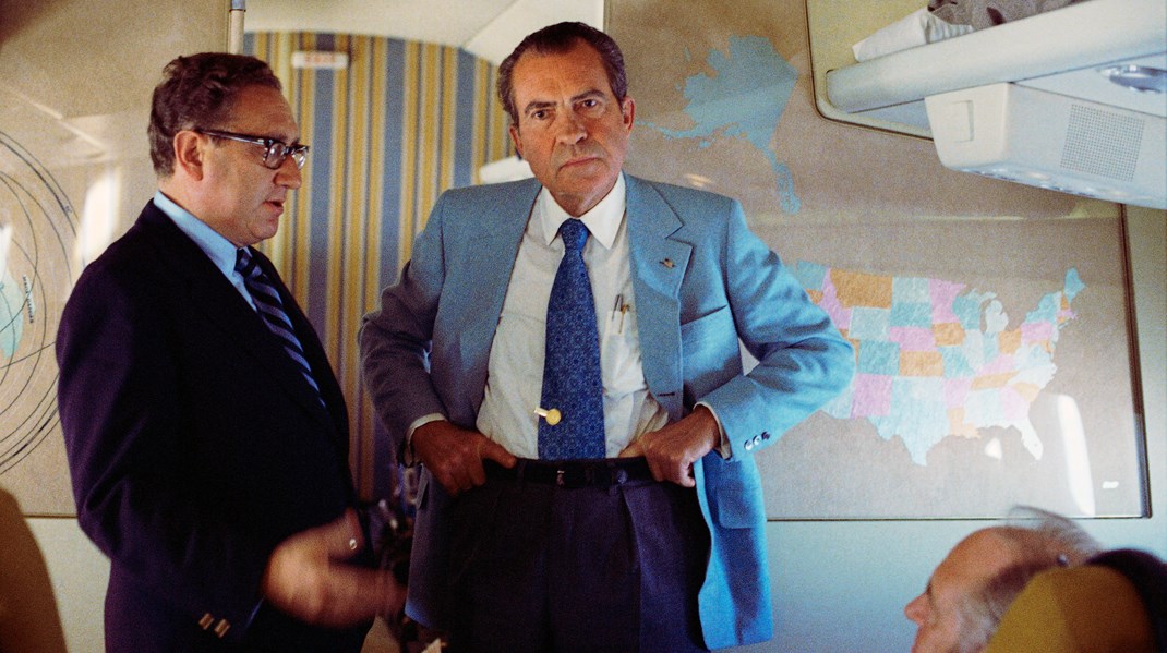 Henry Kissinger og præsident Richard Nixon på Air Force One under deres besøg i Kina i 1972.